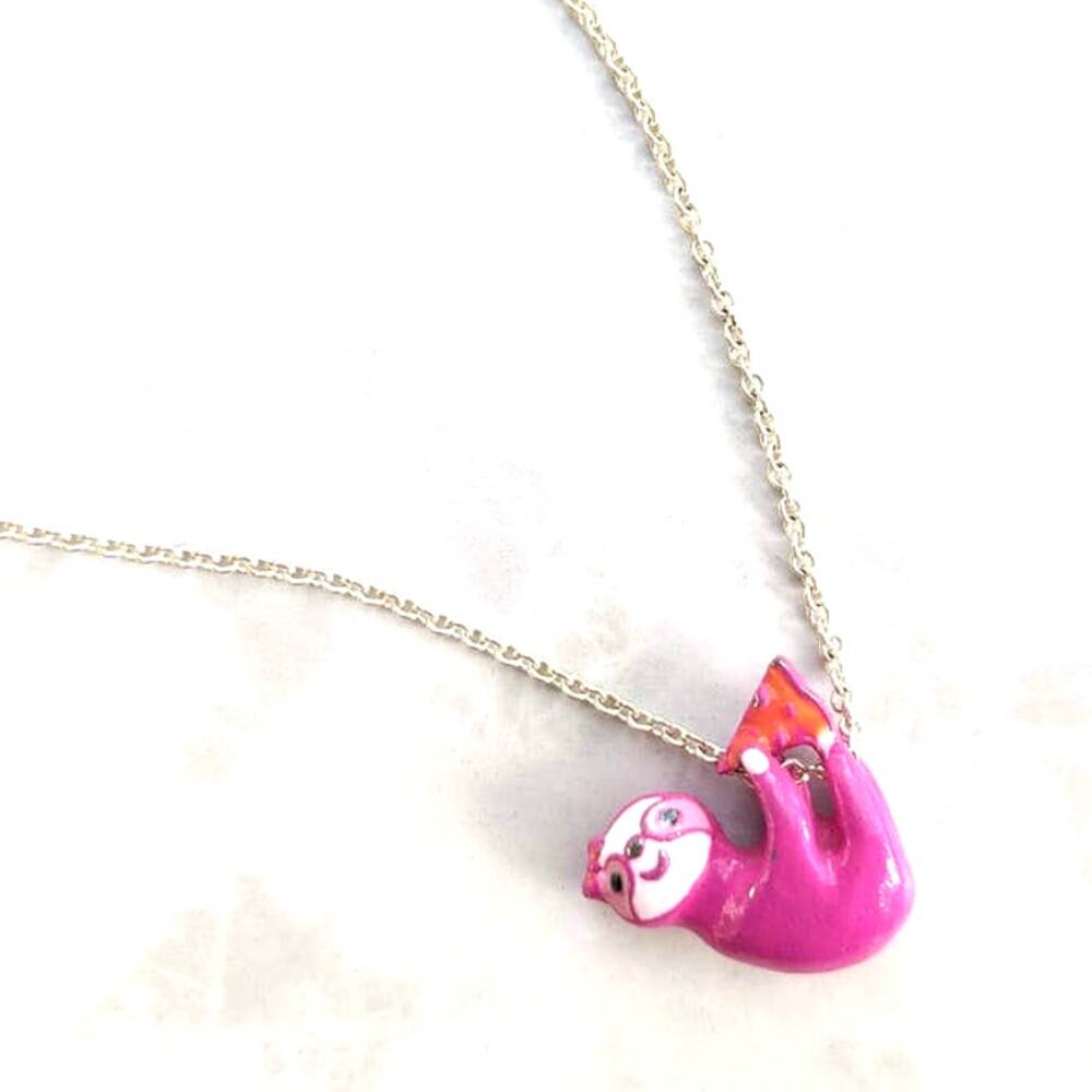Pink hanging sloth necklace from Claire's